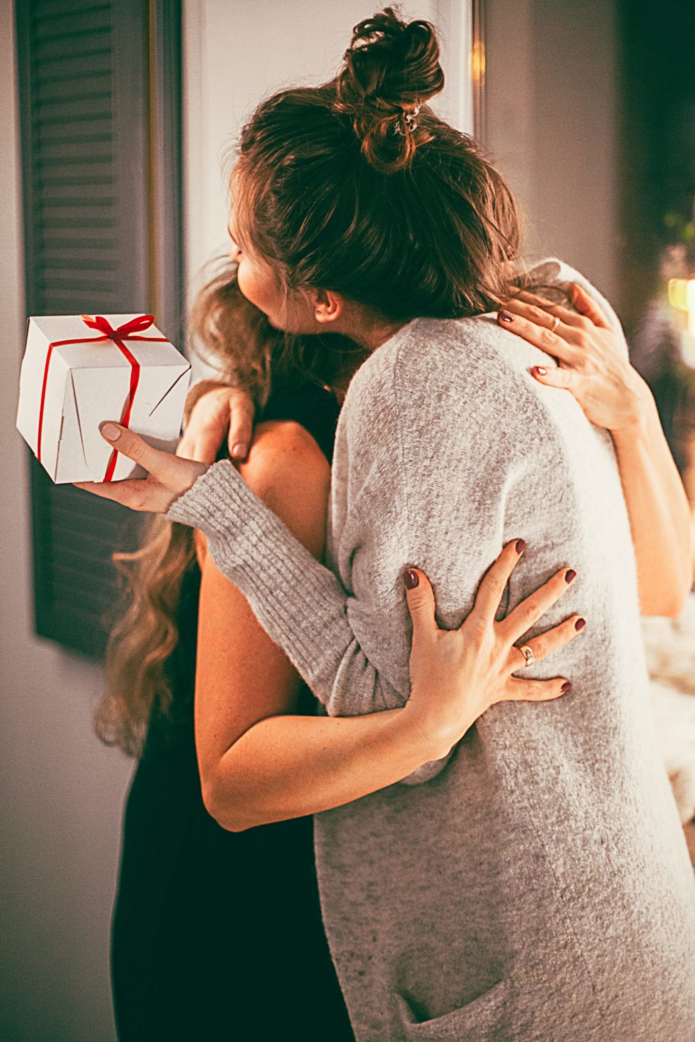 Two Woman Hugging Each Other Bridal Shower