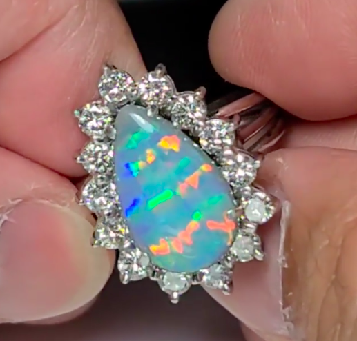 black opal ring with diamonds