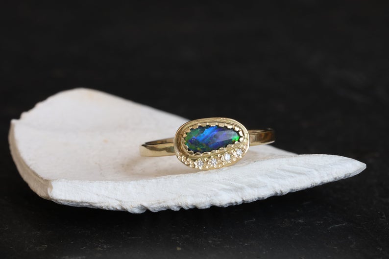 Unique black opal rings