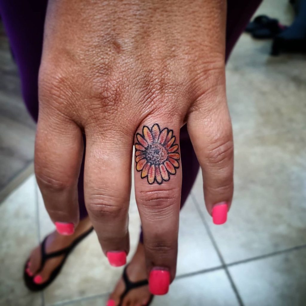 hand sunflower tattoo