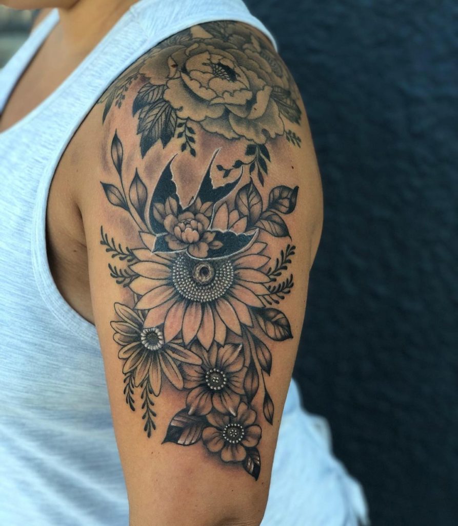 Sunflower on thigh by Sorin Gabor : Tattoos
