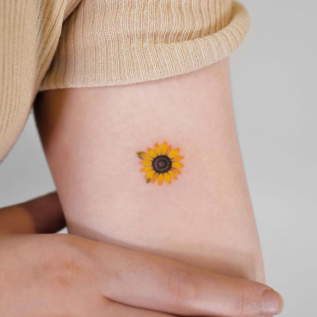 sunflower tiny tattoo weist｜TikTok Search