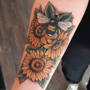 forearm sunflower tattoo