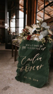 emerald and gold wedding signage